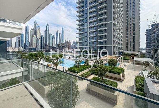 LOWEST PRICE ON MARKET | CORNER UNIT | POOL & MARINA VIEW - Image 1